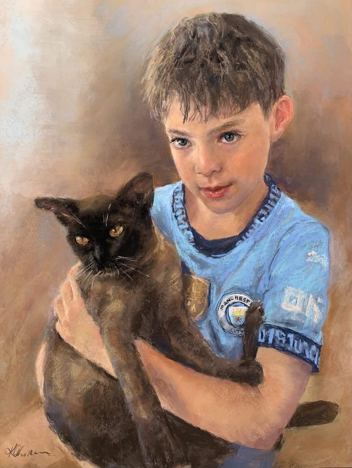 A finished pastel portrait of a boy in a football shirt holding a dark cat